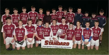  ??  ?? The St. Martin’s boys with the spoils of success after the New Ross Standard Under-14 football Division 1 shield final.