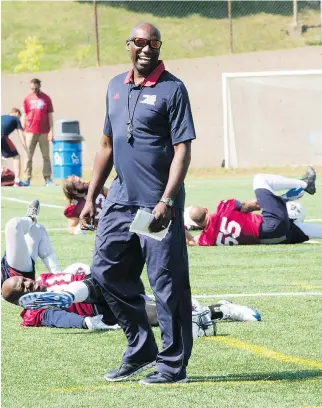  ?? RYAN REMIORZ/THE CANADIAN PRESS ?? Alouettes general manager and new interim head coach Kavis Reed runs the team’s practice on Wednesday. Reed said that two coaches with CFL experience will be added to the staff.