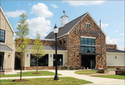  ?? PETE BANNAN-DIGITAL FIRST MEDIA ?? The latest P.J. Whelihan’s restaurant opens Monday at Charlestow­n Village on Route 29 near the Turnpike slip ramp exit.