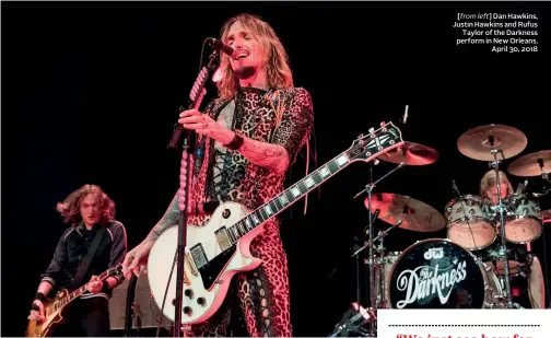  ?? ?? [from left] Dan Hawkins, Justin Hawkins and Rufus Taylor of the Darkness perform in New Orleans, April 30, 2018