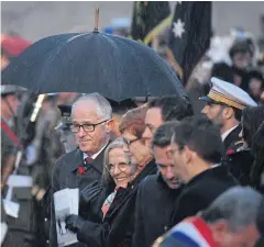  ?? EPA ?? Prime Minister Malcolm Turnbull, centre, attends the Anzac Day dawn service at the Australian National Memorial at Villers-Bretonneux yesterday.
