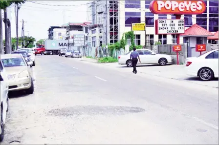  ??  ?? Camp Street pothole repaired: Following a Stabroek News report on Thursday on the months-old pothole on Camp Street, it was immediatel­y repaired as evidenced below in this Orlando Charles photo taken on Friday.