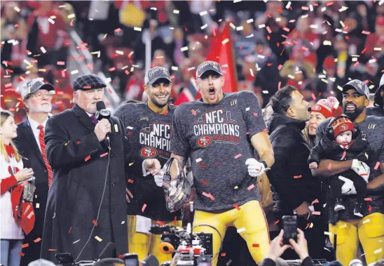  ?? Carlos Avila Gonzalez / The Chronicle ?? With announcer Terry Bradshaw (left), Jimmy Garoppolo, George Kittle and Raheem Mostert exult after the 49ers’ victory over the Packers at Levi’s Stadium.