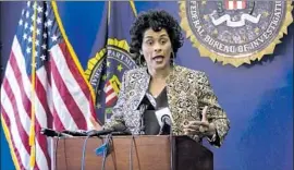  ?? JASON ARMOND Los Angeles Times ?? VOVIETTE MORGAN of the FBI announces the charges in a federal indictment involving a lottery scheme that targeted older Latina women in the Southland.