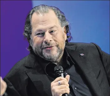  ?? Eric Risberg The Associated Press ?? An anonymous donor made a winning bid of $200,100 for a private lunch with software titan Marc Benioff. The auction raises money for the Glide Foundation.