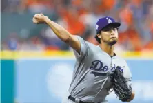  ?? Brett Coomer / Houston Chronicle 2017 ?? Yu Darvish, seen in World Series Game 3, joins the Cubs after four-plus seasons in Texas and two months with the Dodgers.