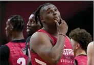  ?? DAVID J. PHILLIP — THE ASSOCIATED PRESS ?? North Carolina State forward DJ Burns Jr. looks on during practice April 5 in Glendale, Ariz.