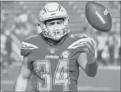  ?? John Cordes Associated Press ?? CHARGERS FULLBACK Derek Watt primarily blocks but figures he’ll cross paths with T.J. tonight.