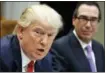  ?? EVAN VUCCI — THE ASSOCIATED PRESS ?? Treasury Secretary Steven Mnuchin listens at right as President Donald Trump speaks during a meeting on the Federal budget in the Roosevelt Room of the White House in Washington.