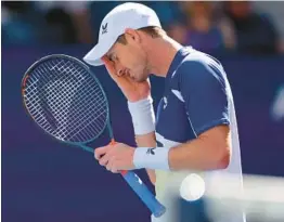  ?? MIKE STOBE/GETTY ?? Andy Murray reacts against Matteo Berrettini during their third-round match of the U.S. Open on Friday in New York.