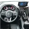  ??  ?? The interior of the 2019 Acura RDX is cluttered with buttons — but that’s a good thing.