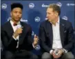  ?? MATT SLOCUM — THE ASSOCIATED PRESS ?? Philadelph­ia 76ers’ draft pick Markelle Fultz, left, speaks during a news conference with team president Bryan Colangelo at the team’s NBA basketball training complex, Friday in Camden, NJ.