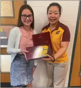 ?? PHOTO COURTESY OF CMU ?? Ling Zhang (right), Central Michigan University’s director of graduate and internatio­nal student recruitmen­t, visited Mariia Smahliuk at Mt. Pleasant High School last week.