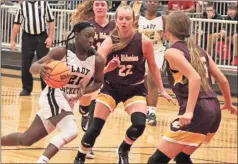  ?? Jeremy Stewart ?? Rockmart’s Keyarah Berry (21) drives to the inside against Dade County during Friday’s girls’ semifinal game at Chattooga.