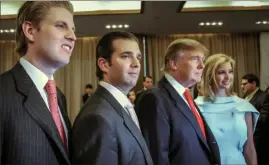  ?? Mark Lennihan/Associated Press ?? Donald Trump, chairman and CEO of the Trump Organizati­on, poses with his children, from left, Eric, Donald Jr. and Ivanka, at the opening of the Trump SoHo New York on April 9, 2010. Donald Trump’s company was convicted of tax fraud on Dec. 6 for a scheme by top executives to avoid paying personal income taxes on perks such as apartments and luxury cars. As punishment, the Trump Organizati­on could be fined up to $1.6 million.