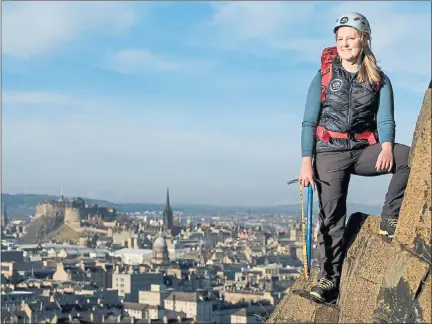  ??  ?? HIGH AMBITION: Mollie Hughes, who aims to climb Everest for a second time, hones her skills on Salisbury Crags in Edinburgh. Picture: Mike Wilkinson