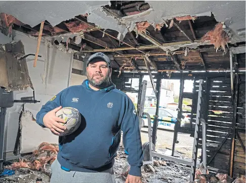  ??  ?? DEVASTATED: Rosyth Sharks president Ben Morris surveying the fire damage at the Harley Street clubhouse.