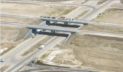 ?? BRANDON HARDER FILES ?? An aerial photo shows work being done on the Regina Bypass. Originally forecast to cost $400 million, the project came in at $1.9 billion by the time it opened in October.