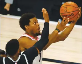  ?? The Associated Press ?? Kyle Lowry drives to the basket against Garrett Temple of the Brooklyn Nets during the NBA basketball first-round playoff series, which the Raptors swept. The team is hoping he’ll be ready to go Thursday against the Boston Celtics.