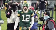  ?? Morry Gash / Associated Press ?? Packers quarterbac­k Aaron Rodgers walks off the field after Sunday’s loss in the NFC championsh­ip game.