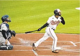  ?? KENNETH K. LAM/BALTIMORE SUN ?? Orioles center fielder Cedric Mullins, hitting a home run against the New York Yankees in Baltimore on April 26, will be the American League’s starting center fielder in the 2021 MLB AllStar Game.