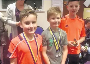  ??  ?? 12 and under Boys Doubles Winners Matthew Noble and Rory Hepworth (front) defeated Dean Hartley and Luke Fulton