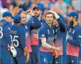  ?? REUTERS ?? England's Mark Wood celebrates the wicket of Australia's Glenn Maxwell.