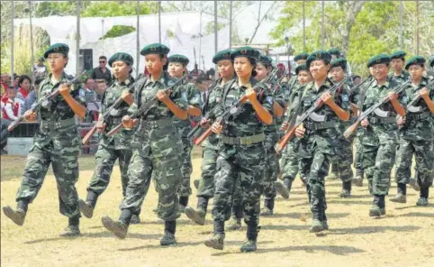  ?? GETTY IMAGES ?? ■ The Women Arms wing of the separatist National Socialist Council of Nagaland-Isak Muivah (NSCN-IM) marches during the 35th Naga Republic Day on March 21, 2014