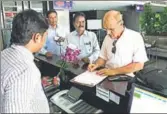  ?? HT ?? A French consulate official collects details of voters in Yanam, a town situated in East Godavari district of Andhra Pradesh.