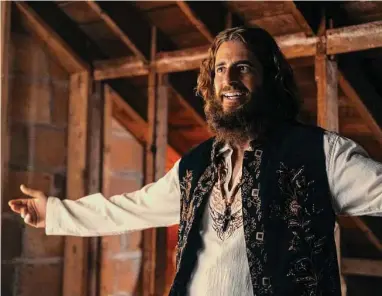  ?? Lionsgate ?? Jonathan Roumie portrays hippie evangelist Lonnie Frisbee in “Jesus Revolution.”