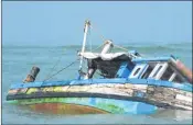  ??  ?? The sinking fishing boat off Kochi coast on Sunday