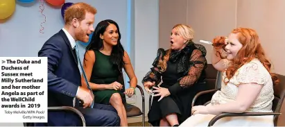  ?? Toby Melville/WPA Pool/ Getty Images ?? The Duke and Duchess of Sussex meet Milly Sutherland and her mother Angela as part of the WellChild awards in 2019