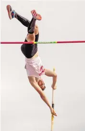  ?? CHANCEY BUSH/JOURNAL ?? Los Alamos’ Kyle Hatler attempts to get over the bar Saturday in the pole vault at the Great Southwest Track and Field Classic. He finished 10th in the event at UNM.