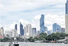  ?? MEKLOY PONGPET ?? The Bangkok skyline as seen from the majestic Chao Phraya River.