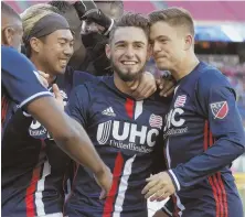  ?? AP FILE PHOTO ?? CENTER OF ATTENTION: Revolution forward Diego Fagundez (center) has gone from teenage prodigy to a 22-year old veteran along with the likes of Lee Nguyen (left) and Kelyn Rowe (right).