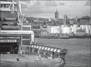  ?? The New York Times/ANDREW TESTA ?? A ship enters the port of Aberdeen, Scotland, a hub for servicing North Sea oil platforms, in this photo from 2015.