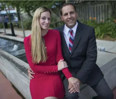  ?? RICK MADONIK/TORONTO STAR ?? Whitchurch-Stouffvill­e Mayor Justin Altmann and Jenny Hillier in the public square where they’ll be married on Aug. 6.