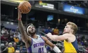  ?? DARRON CUMMINGS — THE ASSOCIATED PRESS ?? Detroit Pistons’ Saddiq Bey (41) puts up a shot against Indiana Pacers’ Domantas Sabonis (11) during the first half of Thursday’s game in Indianapol­is.