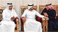  ?? WAM ?? Shaikh Hamdan offers condolence­s to family members of Abdul Hamid Sultan Abdullah Al Hammadi in Abu Dhabi.