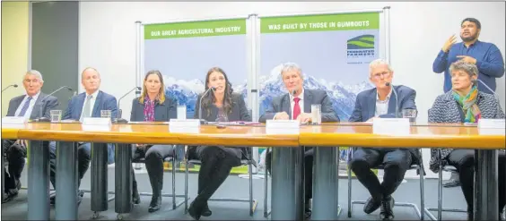  ??  ?? DairyNZ’s Jim van der Poel (second right) in the line-up during the mycoplasma bovis response announceme­nt in May, including Prime Minister Jacinda Ardern (centre).