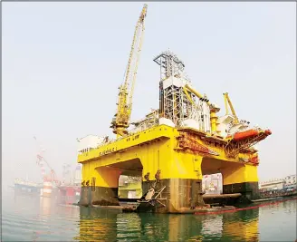  ??  ?? This photo shows a semi-submersibl­e drilling platform in the waters off Yantai, in China’s Shandong province. China has joined efforts to tap the world’s vast deposits of natural gas hydrates or ‘combustibl­e ice’, but it will be
years before the...