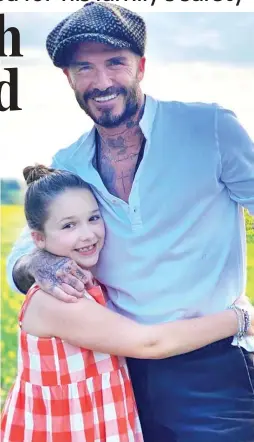  ?? ?? Protective: David Beckham with his daughter Harper, 11