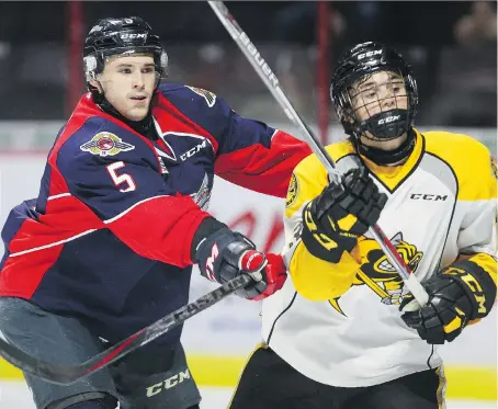  ?? NICK BRANCACCIO ?? After spending last season on the team’s third defensive pairing, overager Austin McEneny, left, will be asked to log big minutes on the Spitfires blue-line alongside Tyler Nother, with Jalen Chatfield, Logan Stanley, Mikhail Sergachev and Sean Day all...