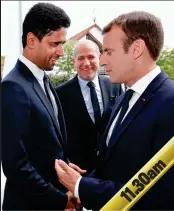  ?? EPA ?? French president Emmanuel Macron (right) says to PSG president Nasser al-Khelaifi at an event: ‘I understand there’s been some good news’.