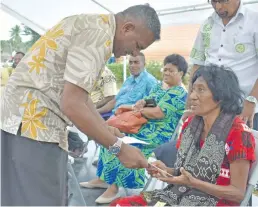  ?? Photos:Shratika Singh ?? Minister for Industry, Trade, Tourism, Lands and Mineral Resources Faiyaz Koya gave Micro and Small Business Grant to Semisi Naqiso (left) and Mere Luveniyali (right )at Seaqaqa Primary School on October 27, 2017.