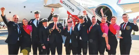  ??  ?? ■ Above: Qantas Group CEO Alan Joyce (centre) and crew celebrate after the completion of the non-stop test flight from New York to Sydney yesterday. ■ Left: Captain Sean Golding (left) and first officer Jeremy Sutherland. ■ Passengers and crew exercising.