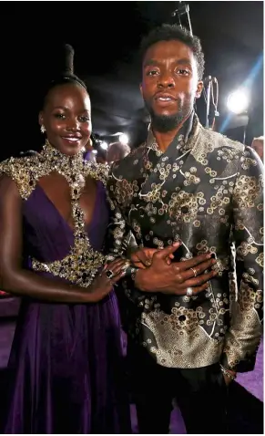  ?? — Reuters ?? Boseman and Lupita Nyong’o at the premiere of Black Panther in Hollywood.