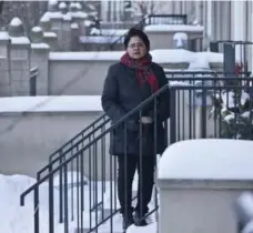  ?? TARA WALTON/TORONTO STAR ?? Dr. Mary Chakkalack­al outside the townhouse where she lives, which the Catholic school board wants to expropriat­e to build a new school.