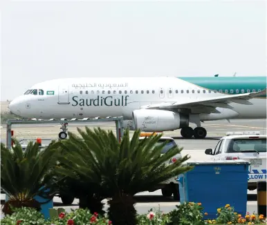  ?? (Faisal al Nasser/Reuters) ?? A SAUDIGULF Airlines Airbus A320-200 airplane is seen at Saudi Arabia’s Abha airport last month.