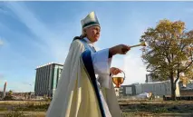  ?? PHOTO: KIRK HARGREAVES/FAIRFAX NZ ?? Bishop Victoria Matthews in 2012 blessing the site where the Cardboard Cathedral was to sit.